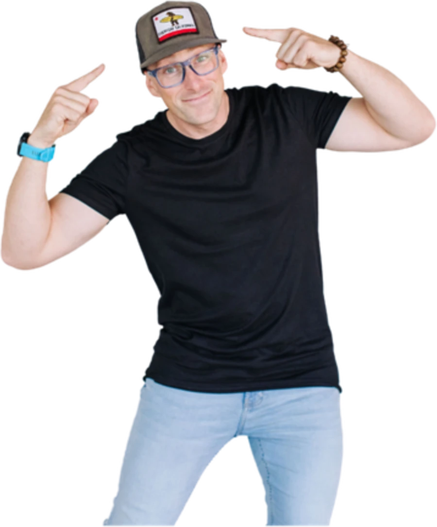 Steve pointing both thumbs at himself, grinning.